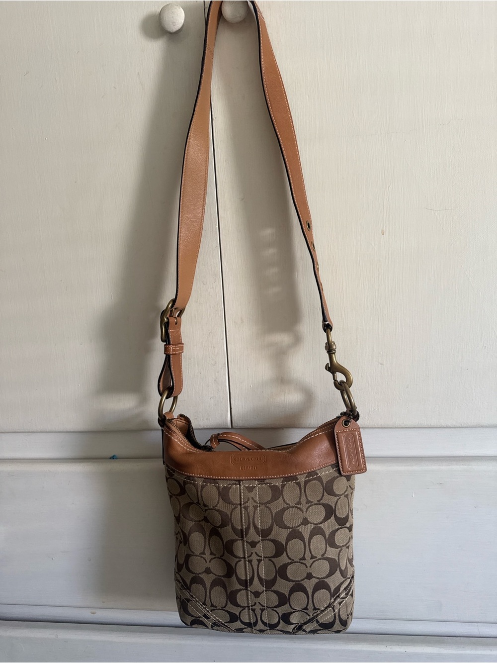 Coach Signature Monogram Bucket Crossbody Bag in Brown